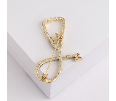 Брошь "Стетоскоп" в черном и золотом цвете: символ профессионализма и уважения, изображение 2